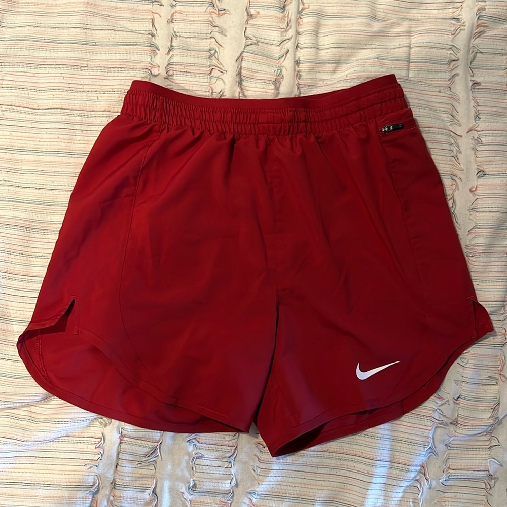 Nike red running shorts